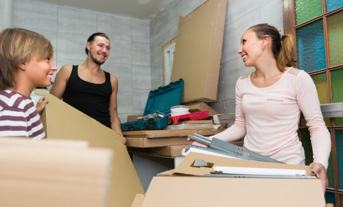 Professional office relocation services in Soho with packed office equipment