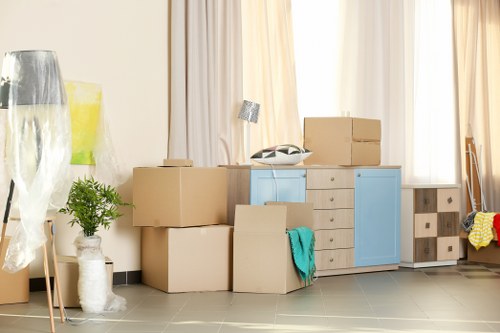 A professional van service loading furniture in Soho