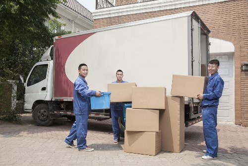 Loading belongings into a van during a Soho relocation