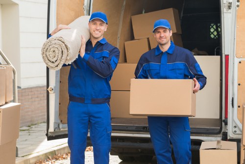 Removal team planning a Soho move in a busy central London street