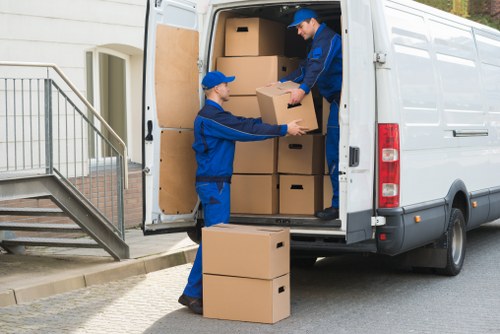 Moving day checklist and packed boxes for Soho removals