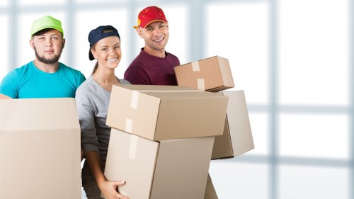 Soho moving van handling boxes and furniture