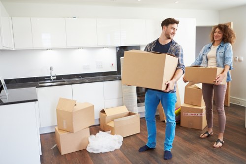 Packed boxes and furniture prepared for house removals in Soho