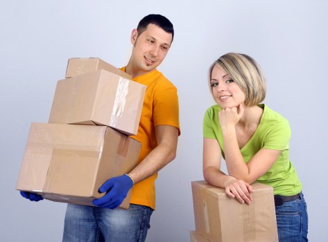 Packed moving boxes ready for a house relocation in Soho