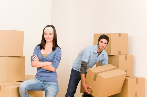 Relocation vehicle loading business assets during a Soho move
