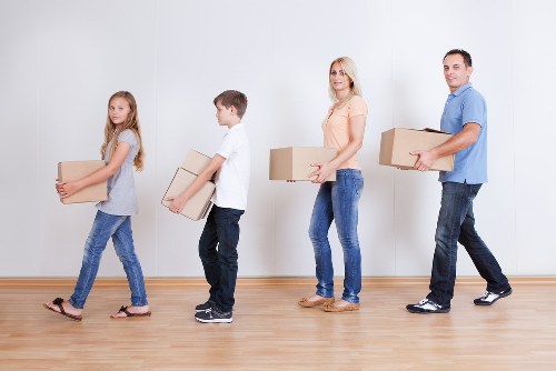 Office removal specialists moving equipment in Soho